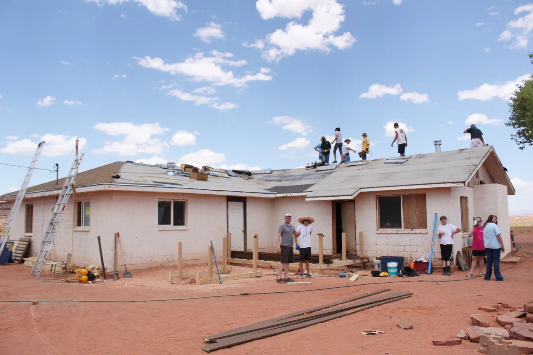 Two groups of Group Cares volunteers worked to replace the roof and build a sturdy new porch with a wheelchair ramp for a Navajo resident in Monument Valley, UT on June 28, 2012. Group Cares is the faith-based nonprofit that facilitates short-term humanitarian trips to repair houses within the US an. Hiring questions for accessibility contractors in an occupied home