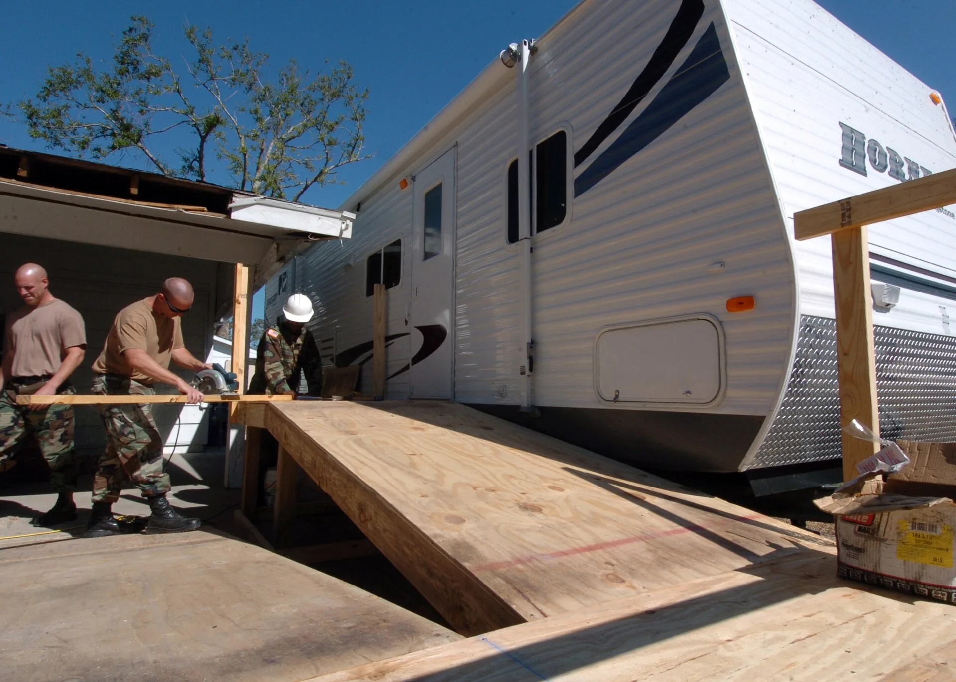 Gulfport, Miss. (Oct. 26, 2005) – U.S. Navy Instructors assigned to Naval Construction Training Center (NCTC) Gulfport, build a ramp that will provide easy entry into a travel trailer for a retired Navy Seabee. The Moral, Welfare and Recreation (MWR) department on board Naval Construction Battalion. Four money regrets in accessible renovation, and how to avoid them
