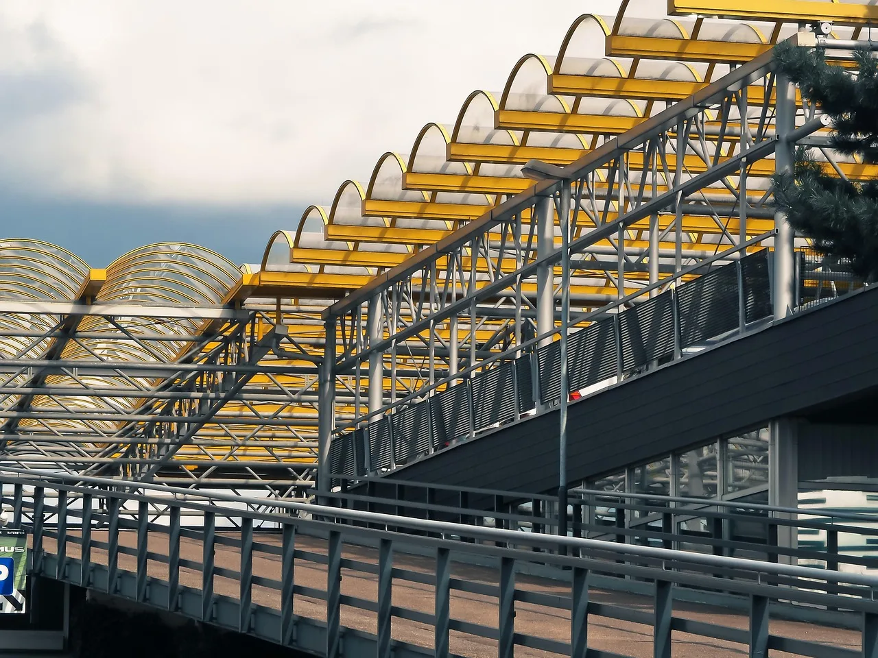 architecture, multi storey car park, glass, ramp, driveway, building, aluminum, facade, dusseldorf, modern, futuristic, swinging, design, city, urban. Accessibility contractors: which type of company to hire